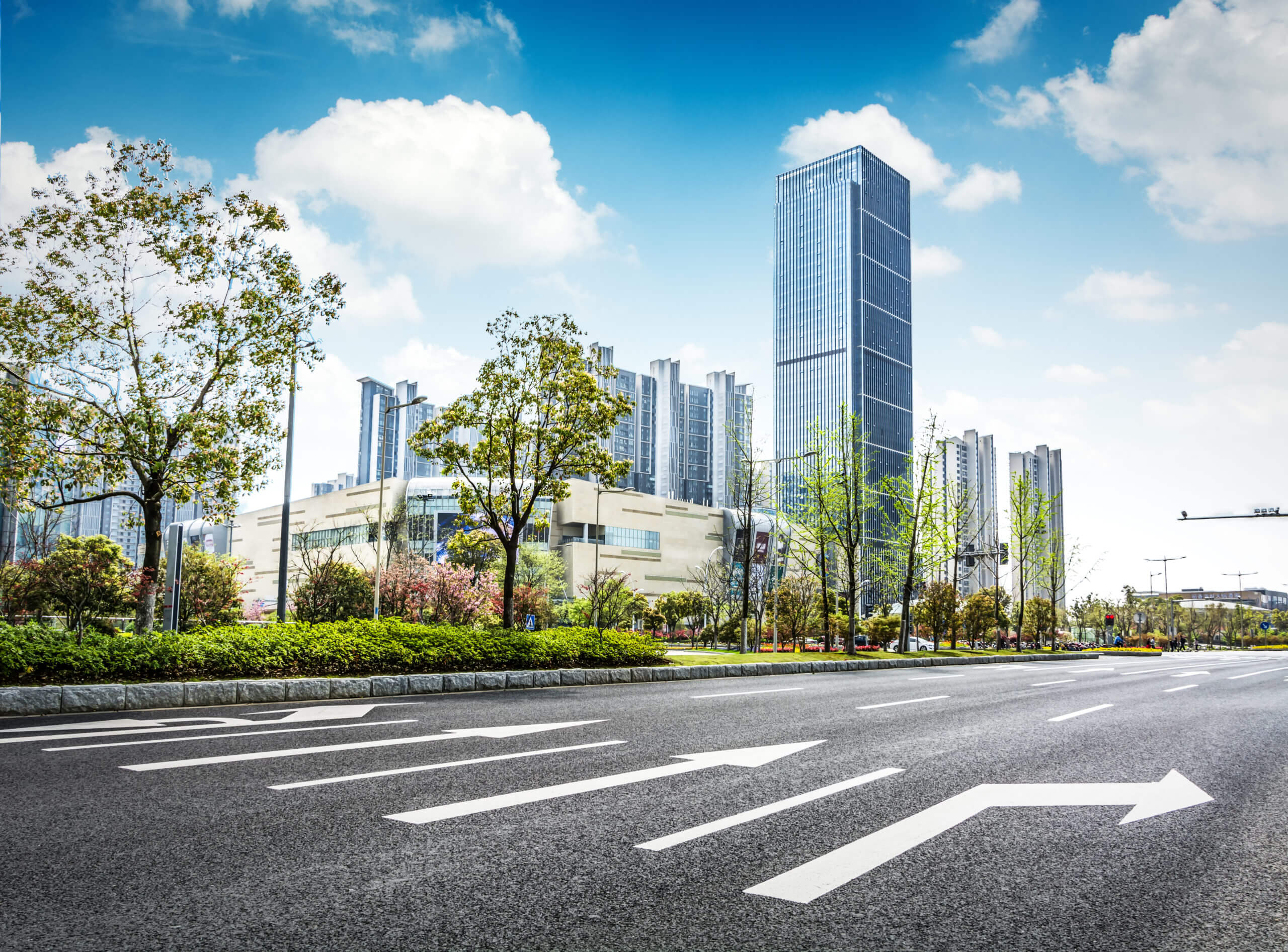 asphalt-road-and-modern-city-scaled